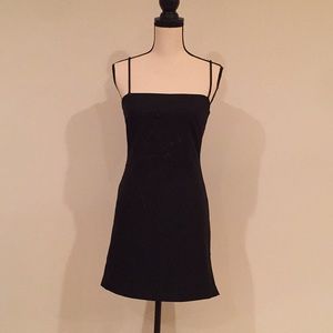 Black spaghetti strapped knee length dress